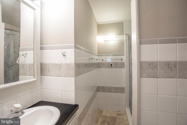 56 Meadowbrook Ave, Hatboro, PA 19040 - bathroom featuring tile walls, tiled shower, and vanity