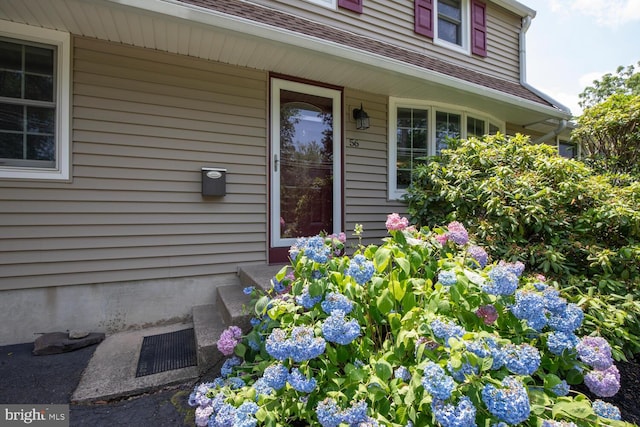 56 Meadowbrook Ave, Hatboro, PA 19040 - view of exterior entry featuring a shingled roof