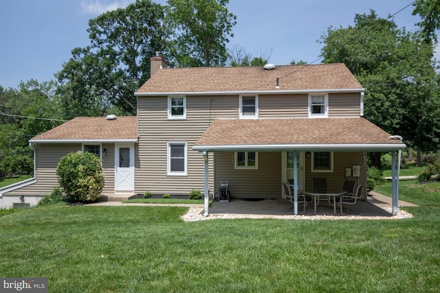 56 Meadowbrook Ave, Hatboro, PA 19040 - rear view of property featuring a chimney, a lawn, roof with shingles, and a patio area