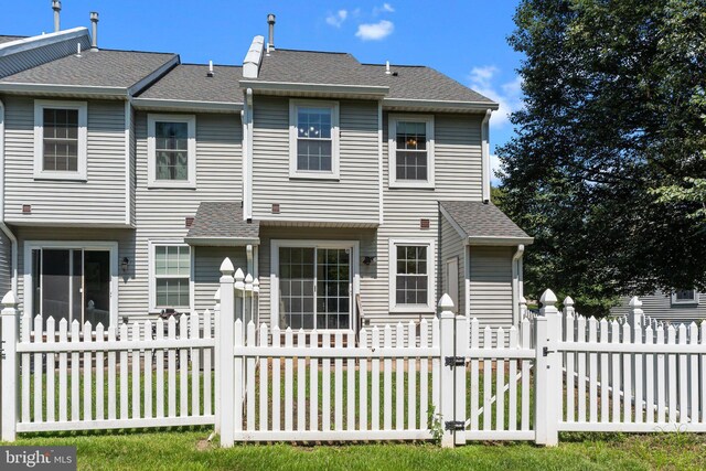 31 Violet Ln, Newtown, PA 18940 - back of house featuring a gate and a shingled roof