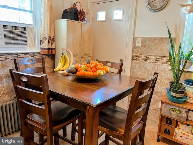 5905 N 3rd St, Philadelphia, PA 19120 - dining space featuring radiator heating unit