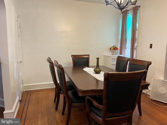 5905 N 3rd St, Philadelphia, PA 19120 - dining room featuring a chandelier and wood finished floors