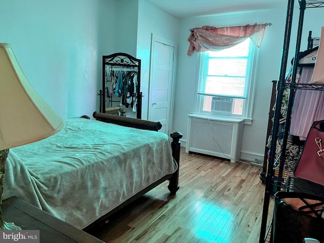 5905 N 3rd St, Philadelphia, PA 19120 - bedroom featuring radiator and wood finished floors