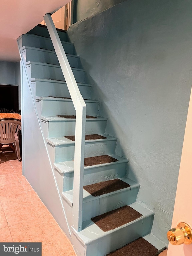 5905 N 3rd St, Philadelphia, PA 19120 - stairway featuring tile patterned floors
