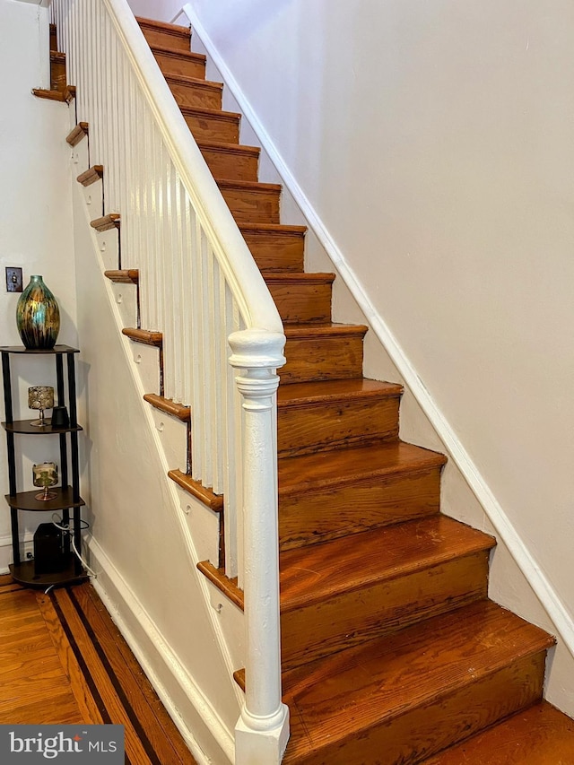 5905 N 3rd St, Philadelphia, PA 19120 - stairs featuring wood finished floors and baseboards