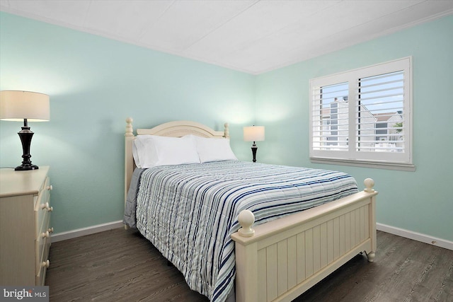 9 76th St Unit 203, Ocean City, MD 21842 - bedroom featuring dark wood finished floors and baseboards