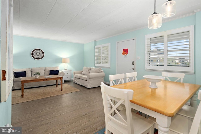 9 76th St Unit 203, Ocean City, MD 21842 - dining space with wood finished floors and ornamental molding