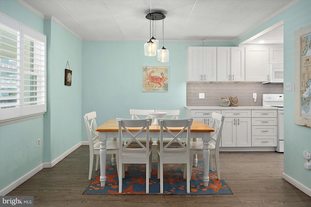 9 76th St Unit 203, Ocean City, MD 21842 - dining room with crown molding and dark wood finished floors