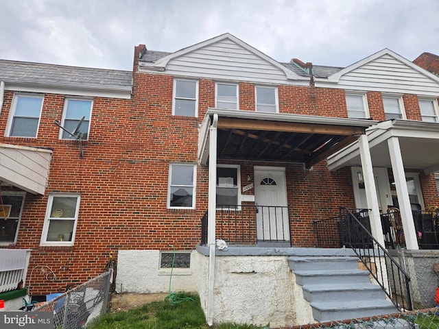2660 Park Heights Ter, Baltimore, MD 21215 - view of property featuring brick siding and a porch