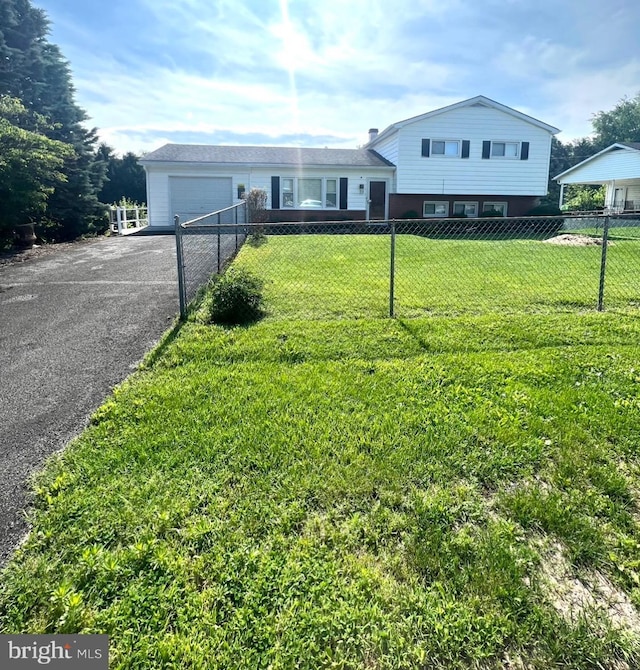 188 Belvedere Dr, Charles Town, WV 25414 - tri-level home featuring asphalt driveway and a garage