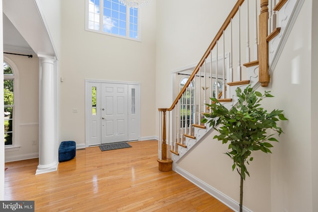 7 Shady Brook Ln, Cranbury, NJ 08512 - entryway featuring ornate columns, plenty of natural light, stairs, and a towering ceiling