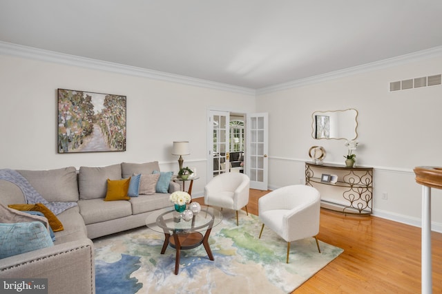 7 Shady Brook Ln, Cranbury, NJ 08512 - living area featuring ornamental molding, wood finished floors, and french doors