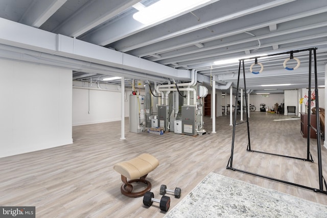 7 Shady Brook Ln, Cranbury, NJ 08512 - finished basement with water heater, wood finished floors, and heating unit