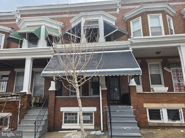 1806 N Bentalou St, Baltimore, MD 21216 - townhome / multi-family property featuring brick siding