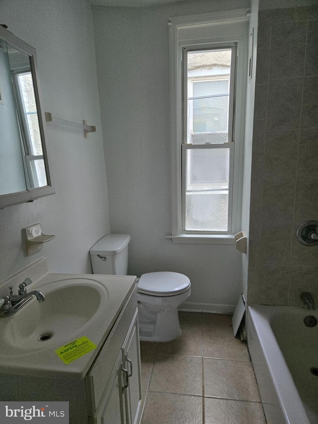 1806 N Bentalou St, Baltimore, MD 21216 - full bathroom with tile patterned flooring, vanity, and shower / bath combination