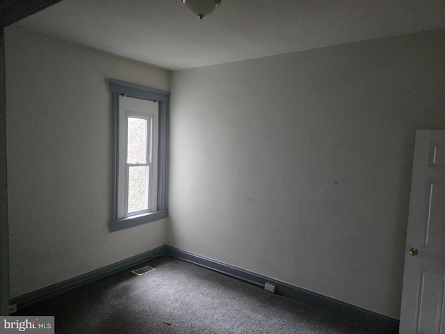 1806 N Bentalou St, Baltimore, MD 21216 - carpeted empty room featuring baseboards