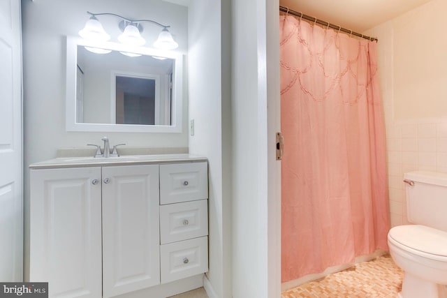 2500 N Van Dorn St Unit 415, Alexandria, VA 22302 - full bathroom featuring vanity, tile walls, curtained shower, and tile patterned flooring