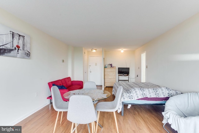 2500 N Van Dorn St Unit 415, Alexandria, VA 22302 - bedroom featuring wood finished floors and baseboards