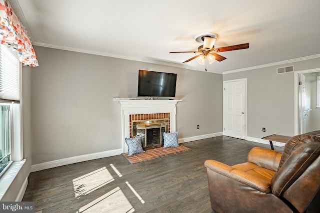 2107 Carol Ln, East Norriton, PA 19401 - living area featuring ceiling fan, wood finished floors, a fireplace, and crown molding