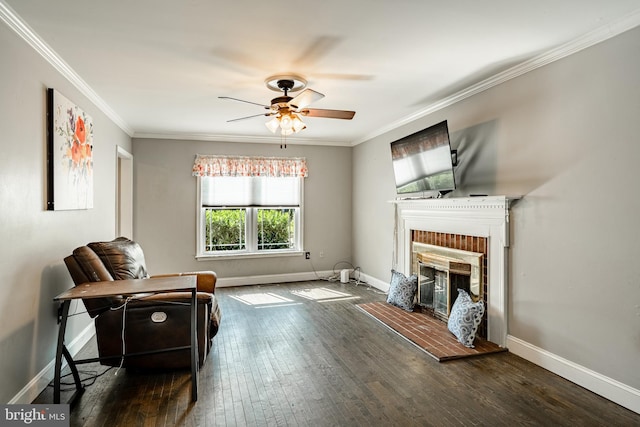 2107 Carol Ln, East Norriton, PA 19401 - living area with ceiling fan, crown molding, wood-type flooring, and a brick fireplace