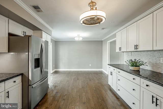 2107 Carol Ln, East Norriton, PA 19401 - kitchen with stainless steel fridge with ice dispenser, backsplash, white cabinetry, dark wood-style flooring, and crown molding