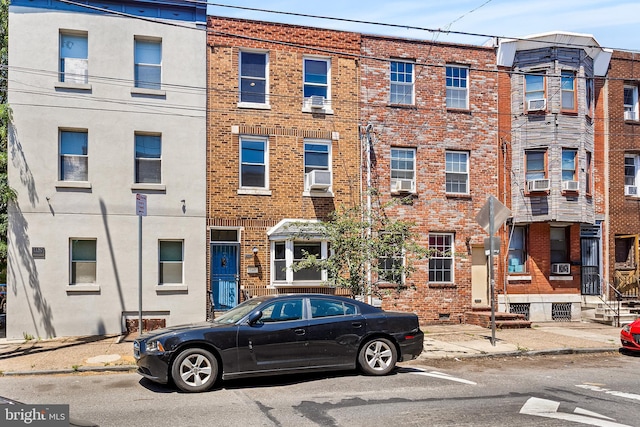1148 S 12th St, Philadelphia, PA 19147 - townhome / multi-family property with brick siding and cooling unit