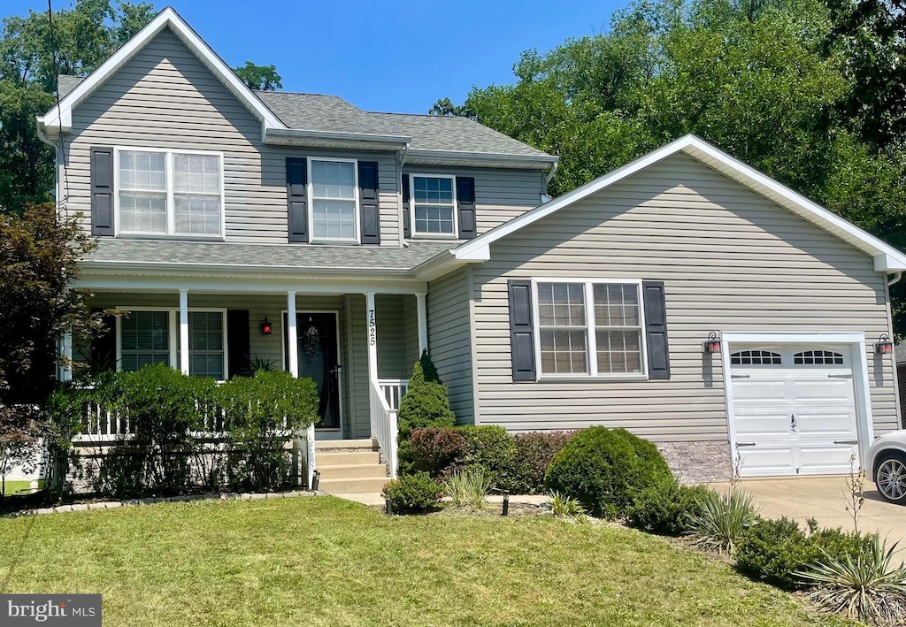 7525 Forrest Ave, Pennsauken, NJ 08110 - view of front of property with a porch, a front lawn, concrete driveway, and a shingled roof