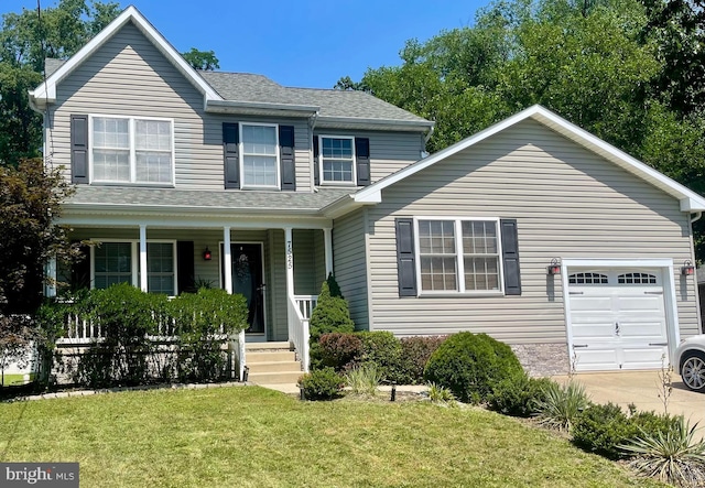 7525 Forrest Ave, Pennsauken, NJ 08110 - view of front of property with a porch, a front lawn, concrete driveway, and a shingled roof