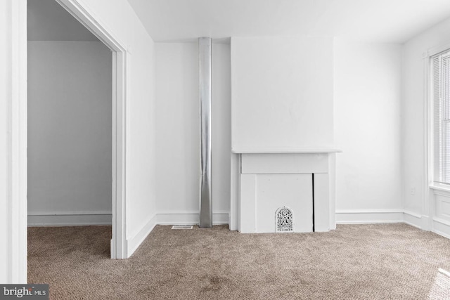 539 Fernon St, Philadelphia, PA 19148 - unfurnished living room with carpet flooring and baseboards