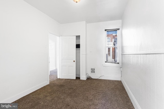 539 Fernon St, Philadelphia, PA 19148 - unfurnished bedroom with dark colored carpet and baseboards