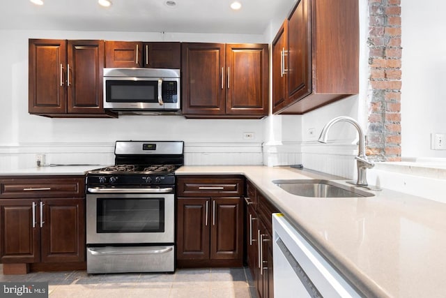 539 Fernon St, Philadelphia, PA 19148 - kitchen featuring appliances with stainless steel finishes, light countertops, recessed lighting, and dark brown cabinetry