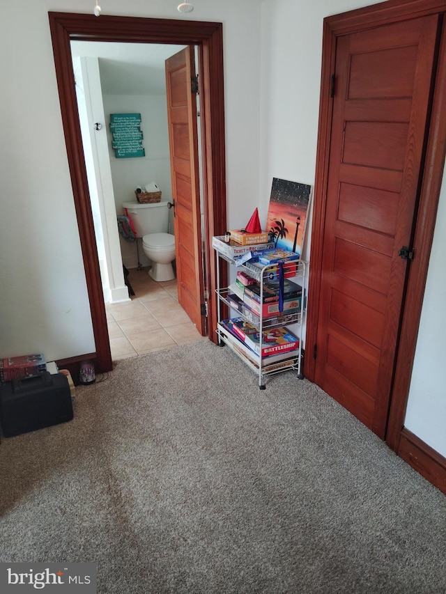 221 Princess St, Hanover, PA 17331 - hallway featuring light colored carpet and light tile patterned flooring