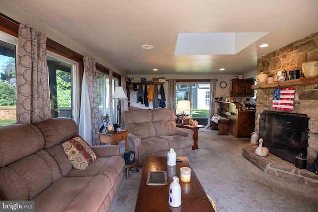 1119 Summit Ave, Front Royal, VA 22630 - living area featuring light colored carpet, a fireplace, a skylight, and recessed lighting
