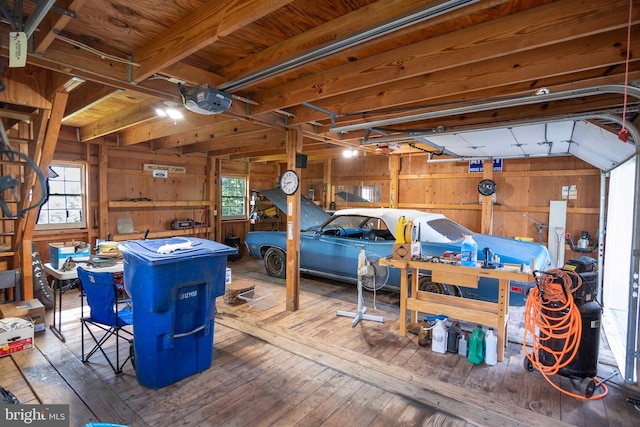 1119 Summit Ave, Front Royal, VA 22630 - garage with wood walls and a garage door opener