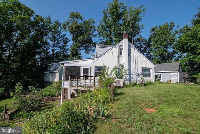 1119 Summit Ave, Front Royal, VA 22630 - back of property with a yard, a wooden deck, a chimney, stairway, and a sunroom
