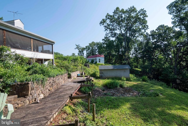 1119 Summit Ave, Front Royal, VA 22630 - view of green lawn with a sunroom and a shed