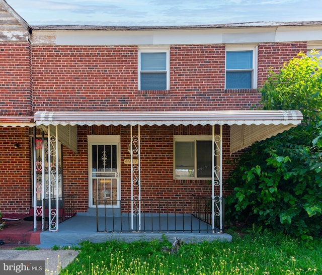 4917 Pembridge Ave, Baltimore, MD 21215 - doorway to property with brick siding