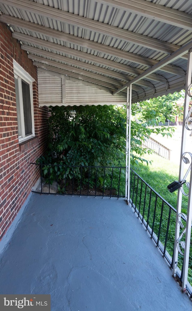 4917 Pembridge Ave, Baltimore, MD 21215 - view of patio / terrace with a carport