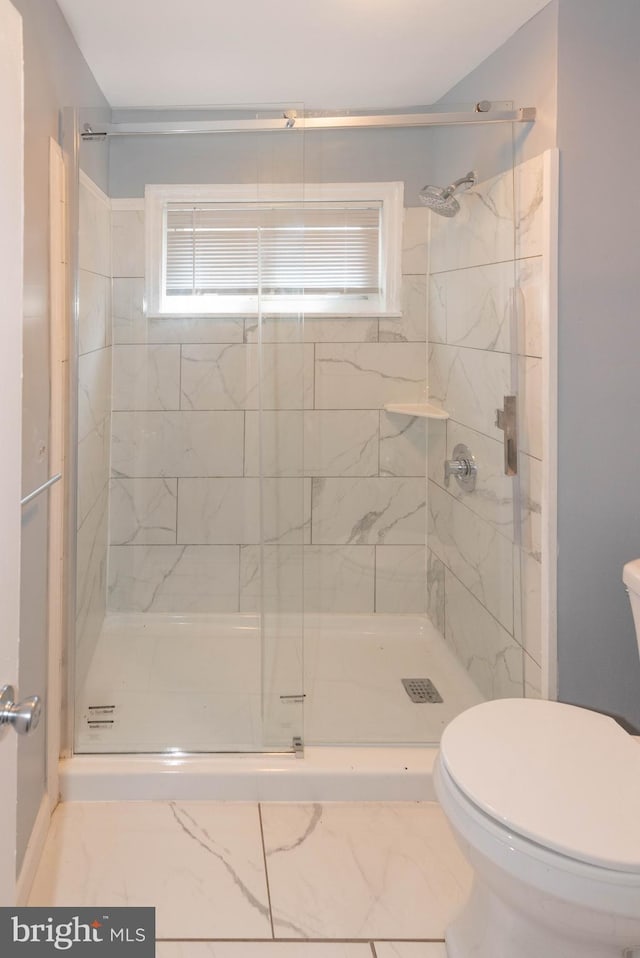 4917 Pembridge Ave, Baltimore, MD 21215 - full bathroom featuring a stall shower and marble finish flooring