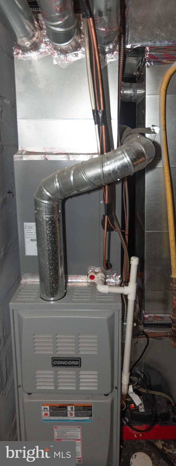 4917 Pembridge Ave, Baltimore, MD 21215 - utility room featuring heating unit