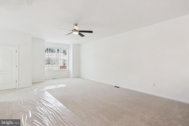 12814 Sutherby Ln, Germantown, MD 20874 - unfurnished room featuring light carpet, a ceiling fan, and a smoke detector