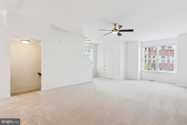 12814 Sutherby Ln, Germantown, MD 20874 - empty room featuring ceiling fan and light colored carpet
