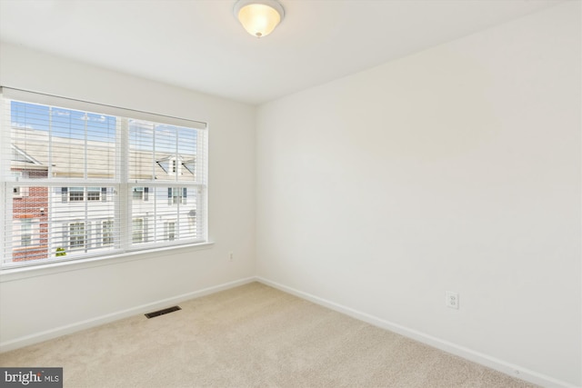 12814 Sutherby Ln, Germantown, MD 20874 - carpeted empty room with baseboards