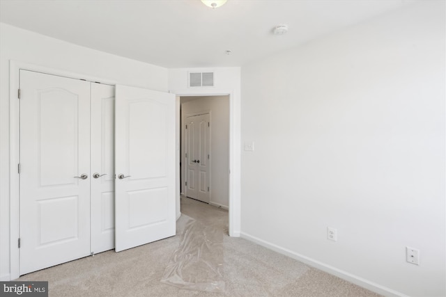 12814 Sutherby Ln, Germantown, MD 20874 - unfurnished bedroom with light carpet and a closet