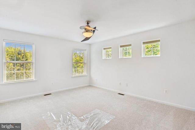 12814 Sutherby Ln, Germantown, MD 20874 - carpeted spare room with ceiling fan and baseboards