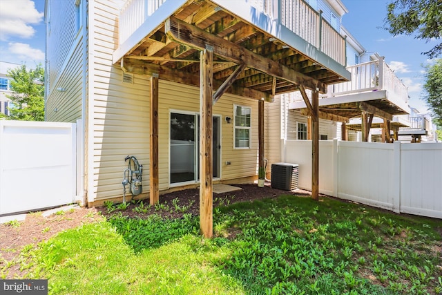 12814 Sutherby Ln, Germantown, MD 20874 - back of house featuring a garage and a deck