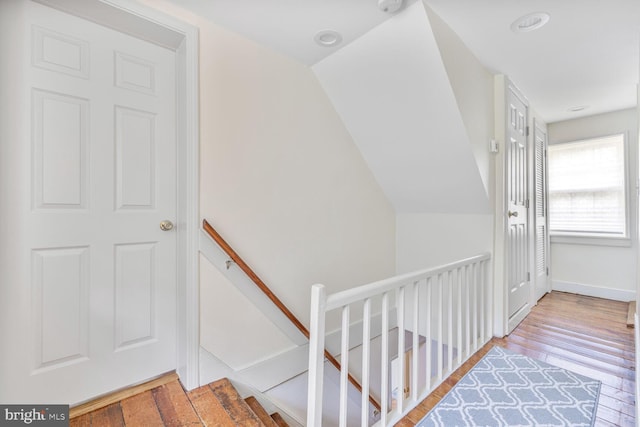 7901 Warfield Rd, Gaithersburg, MD 20882 - stairs featuring wood finished floors