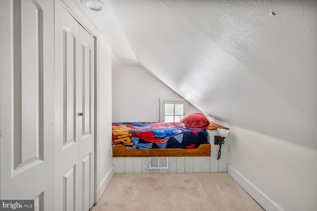 7901 Warfield Rd, Gaithersburg, MD 20882 - carpeted bedroom with lofted ceiling and baseboards