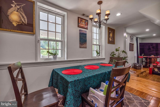 7901 Warfield Rd, Gaithersburg, MD 20882 - dining space with hardwood / wood-style floors, a chandelier, and recessed lighting
