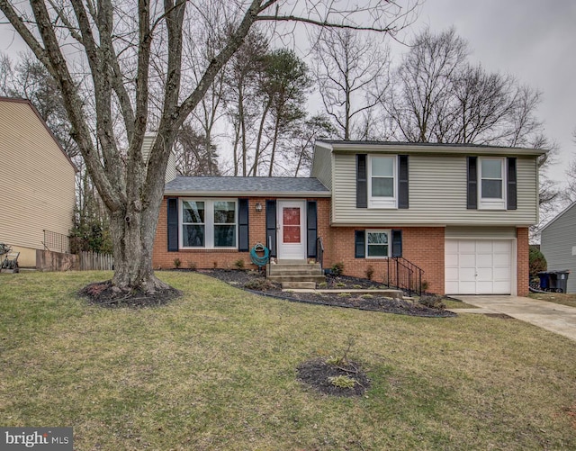 9907 Treetop Ln, Lanham, MD 20706 - split level home featuring brick siding, an attached garage, and concrete driveway